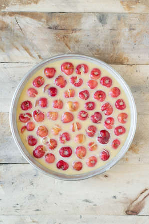 The batter cake of clafoutis, a french creamy cake (with cherries)の写真素材
