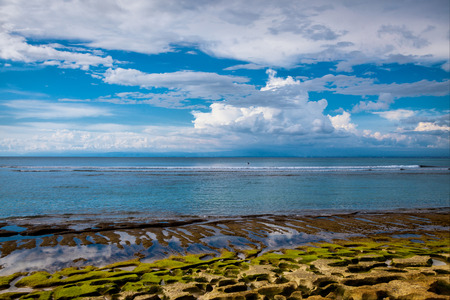 the Rocky beach on Bali island in Indonesiaの写真素材