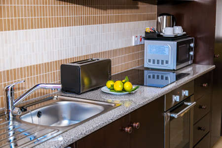 Kitchen in modern apartmentsの写真素材