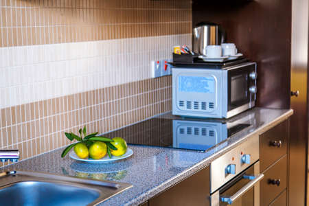 Kitchen in modern apartmentsの写真素材