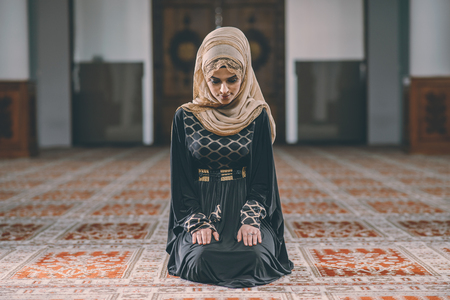 Young Muslim girl praying humblyの写真素材