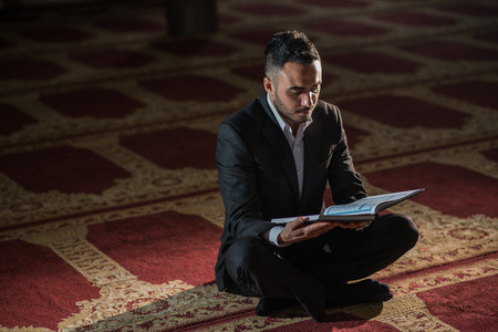 Muslim praying humblyの写真素材