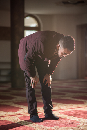 Muslim praying humblyの写真素材