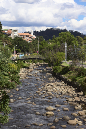 CUENCA, ECUADOR - FEBRUARY 13, 2014: View of the River Tomebamba from the bridge Puente del Centenario on February 13, 2014 in Cuenca, Ecuadorのeditorial素材