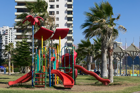 IQUIQUE, CHILE - FEBRUARY 10, 2015: Colorful slide on playground along Cavancha beach on February 10, 2015 in Iquique, Chile. Iquique is a popular beach town and free port city in Northern Chile.のeditorial素材