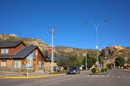 CHILE CHICO, CHILE - FEBRUARY 21, 2016: Building of Gobernacion Provincia General Carrera on O'Higgins Street in Chile Chico, Chile on February 21, 2016. On the right side the Plaza del Viento lookout can be seen. Chile Chico lies on the shore of Chile's のeditorial素材