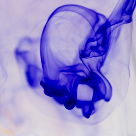 Ink shapes in waterの写真素材