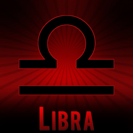 Libra symbol with a red background and black burst.の写真素材