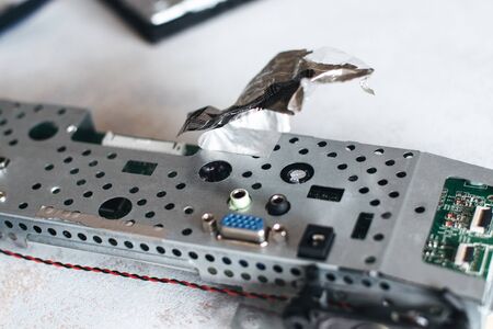 hands and screwdriver - maintenance worker fixing computer.の写真素材
