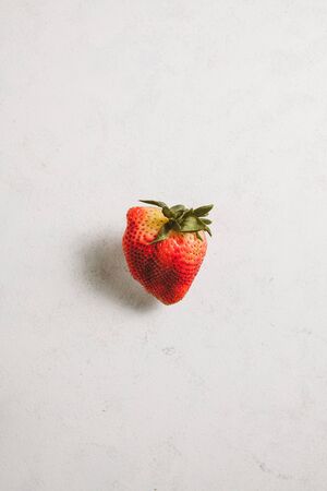 Isolated fresh ripe straberry on white background with shadow.の写真素材