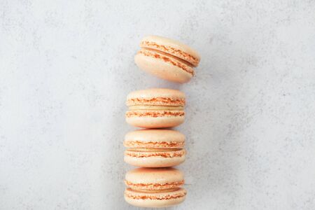 Group of vanilla macaroons on light backgroundの写真素材