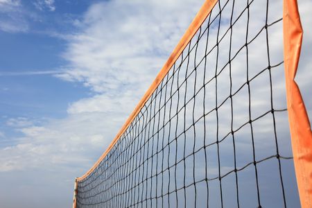 orange beach volleyball net in sunnyの写真素材