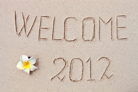 welcome 2012 on beach sandの写真素材
