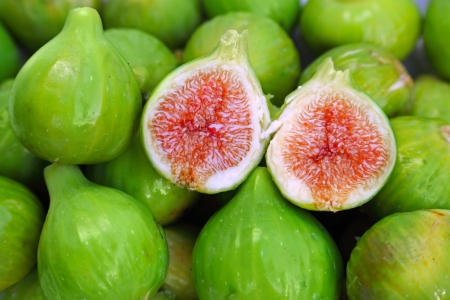 many fresh and ripe green figsの写真素材