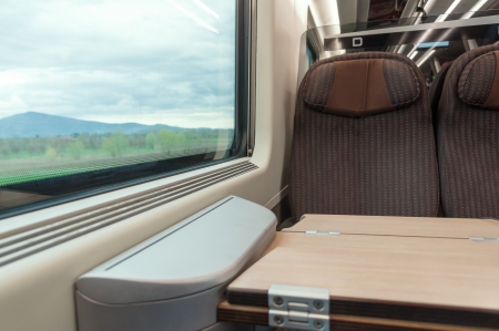 interior of modern train with seat and windowの写真素材