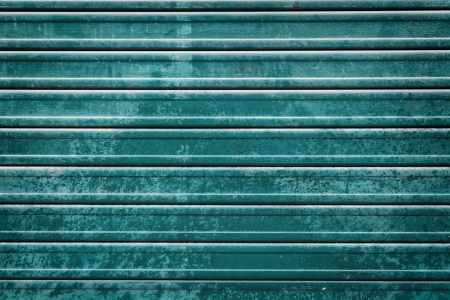 teal roller door grunge background