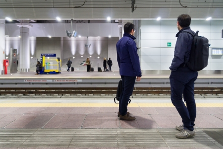 BOLOGNA - NOVEMBER 22: Commuters waiting high speed trains in central station, a brand new and very modern train stations. Bologna, Italy, November 22, 2013.のeditorial素材