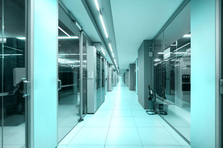 modern corridor in technology building with server behind the glassのeditorial素材