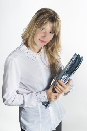 business girl with folders isolated on a white backgroundの写真素材