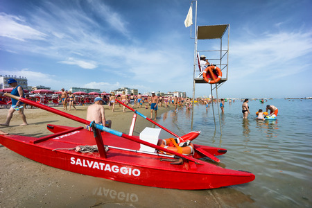 CATTOLICA, ITALY - JUNE 23: crowd of people on the beach on June 23, 2014 in Cattolica, Emilia Romagna, Italy. At the start of the summer the beach of Riviera Romagnola gets full of peopleのeditorial素材