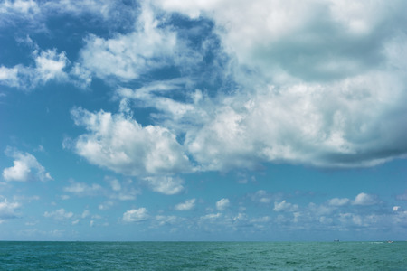 blue sea and deep clouds on skyの写真素材