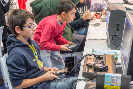 MILAN, ITALY - OCTOBER 26: classic and vintage console at Games Week 2014, event dedicated to video...