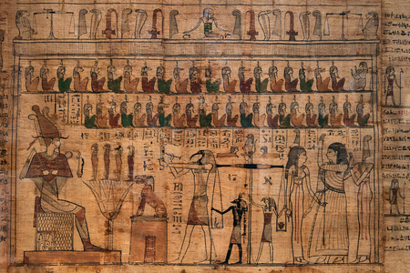 antique hieroglyphs on Egyptian papyrusの写真素材