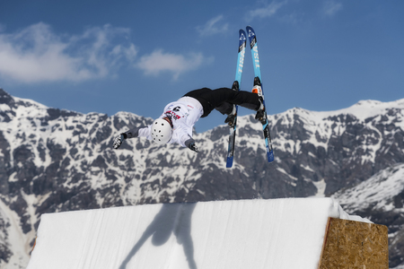 CHIESA VALMALENCO, ITALY - MARCH 31, 2017: Freestyle Ski FIS European Cup, athlete jumpのeditorial素材
