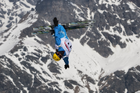 CHIESA VALMALENCO, ITALY - MARCH 31, 2017: Freestyle Ski FIS European Cup, athlete jumpのeditorial素材