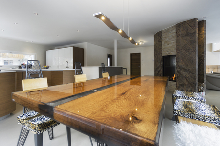 large kitchen and antique wood table in modern styleの写真素材