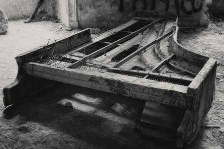 old piano in an abandoned houseの写真素材