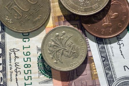 Different currency in bills and coinsの写真素材