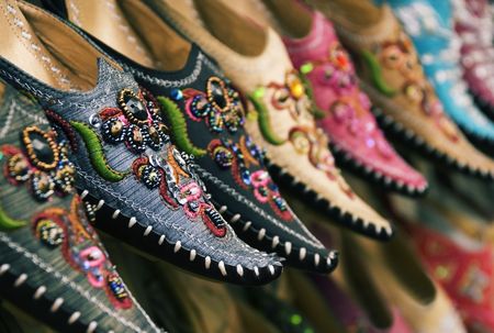 A row of Thai moccasins in a marketの写真素材