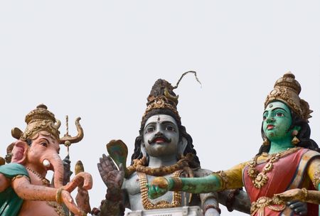 An image of statues representing Shiva, Ganesh and Parvatiの写真素材