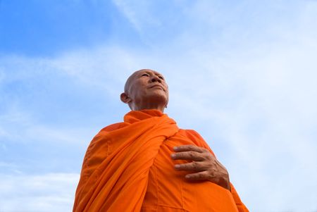 A middle aged Buddhist monk in Thailandの写真素材