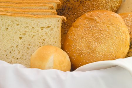 A variety of freshly baked bread in a basket