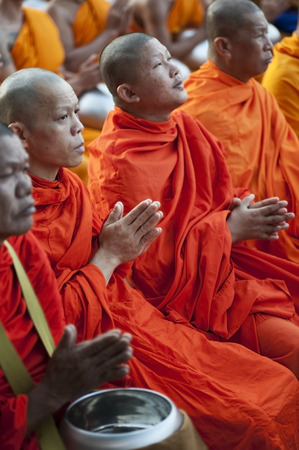 Chiang Mai, Thailand  December 26, 2015: Buddhist monks attend a special alms offering to 10,000 monks ceremony at dawn organized by Wat Phra Dhammakaya on December 26, 2015 in Chiang Mai, Thailand.のeditorial素材