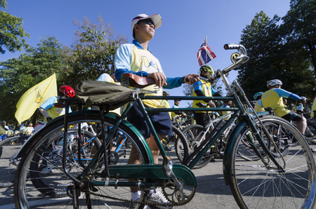 Chiang Mai, Thailand - December 11, 2015: A cyclist waits for the Bike For Dad event to begin on December 11, 2015 in Chiang Mai, Thailand. The Bike For Dad cycling event attracts hundreds of thousands of cyclists and is held across Thailand to celebrate のeditorial素材