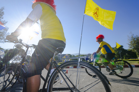 Chiang Mai, Thailand - December 11, 2015: Two cyclists wait for the Bike For Dad event to begin on December 11, 2015 in Chiang Mai, Thailand. The Bike For Dad cycling event attracts hundreds of thousands of cyclists and is held across Thailand to celebratのeditorial素材