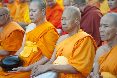 Chiang Mai, Thailand - December 26, 2015: Buddhist monks attend a special alms offering ceremony organized for 10,000 monks by Wat Phra Dhammakaya on December 26, 2015 in Chiang Mai, Thailand.のeditorial素材