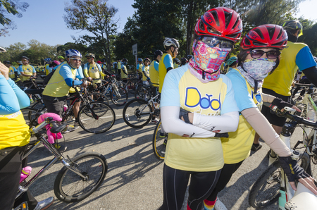 Chiang Mai, Thailand - December 11, 2015: Two women before the Bike For Dad event on December 11, 2015 in Chiang Mai, Thailand. The Bike For Dad cycling event attracts hundreds of thousands of cyclists and is held across Thailand to celebrate the birthdayのeditorial素材