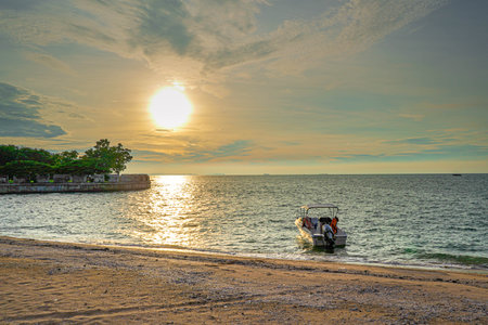 The lonely boat on the shore of Pattayaの写真素材