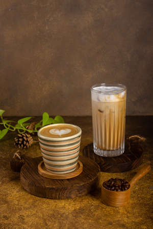 ice cappucino from freshly grinding coffee bean at wooden rustic trayの写真素材