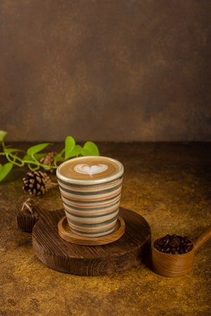 hot cappucino from freshly roasted coffee bean at wooden rustic trayの写真素材