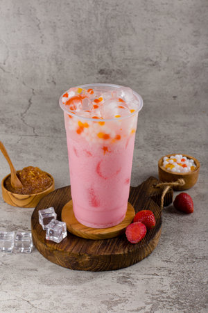 Boba or tapioca pearls is taiwan bubble milk tea in plastic cup with milk cocktail flavor on texture  background, summers refreshment.の写真素材