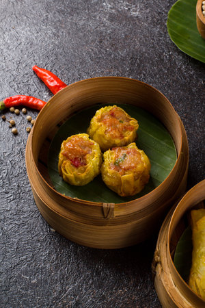Chinese steamed dumpling stuffed with minced pork, shrimp and vegetablesの写真素材