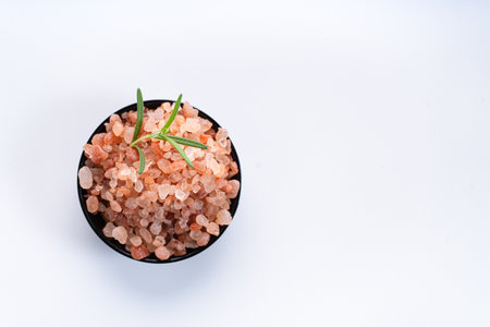 Himalayan pink salt is herb seasoning from himalaya and isolated on white background with copy spaceの写真素材