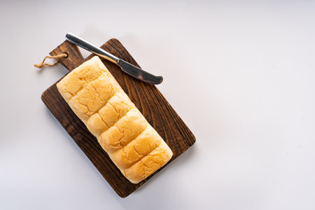 Fresh Baked brioche soft and fluffy bun white Bread or milk bread. isolated white backgroundの写真素材