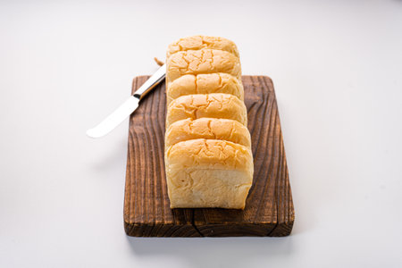 Fresh Baked brioche soft and fluffy bun white Bread or milk bread. isolated white background