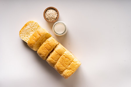 Fresh Baked brioche soft and fluffy bun white Bread or milk bread. isolated white backgroundの写真素材